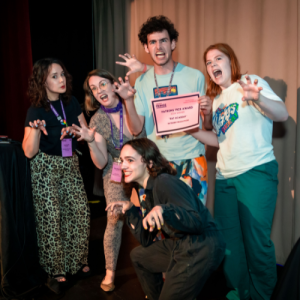 The cast of Rat Academy receives their Patrons' Pick Award