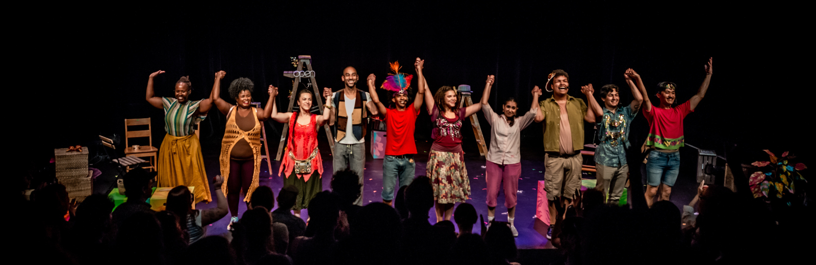 The cast of Boy Boy and the Magic Drum take a bow on stage