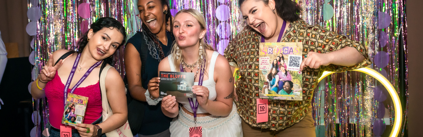 Fringe artists pose at the Fringe patio photo booth
