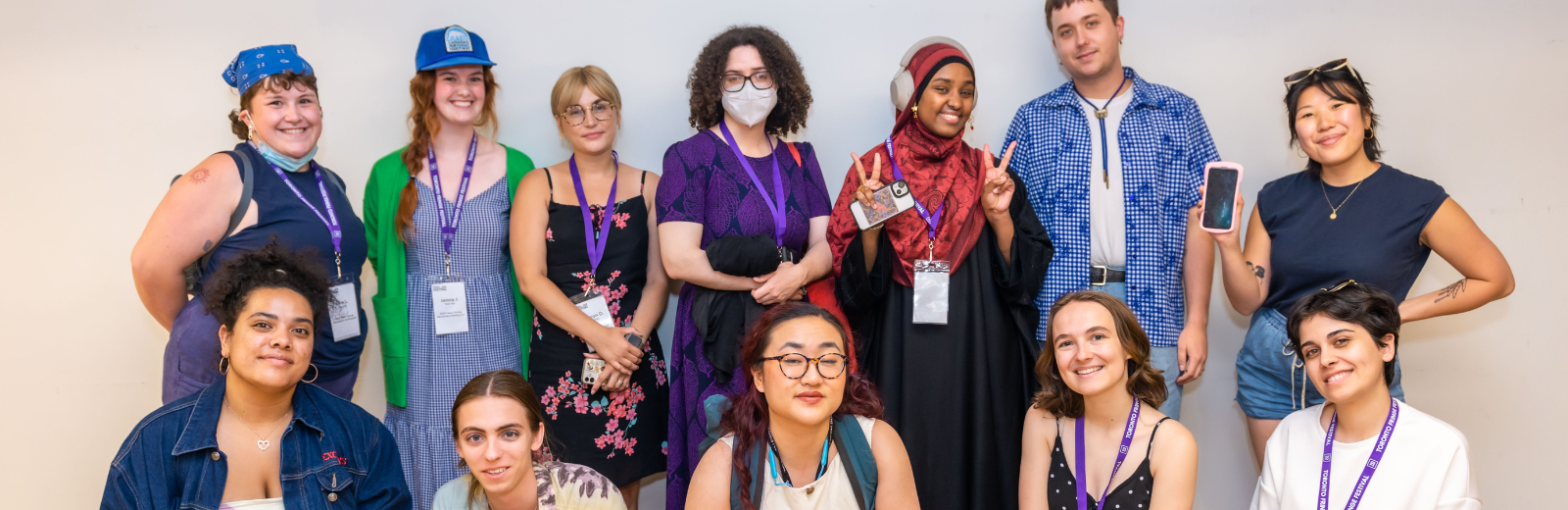 The 2024 cohort of the New Young Reviewers Program smiles at the camera